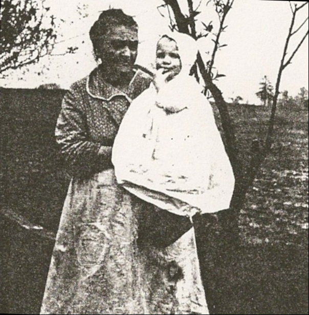 Mary Elizabeth (Gilliland) Rakestraw with her great grandson, Sanford "Bud" Wiseheart, circa 1924.